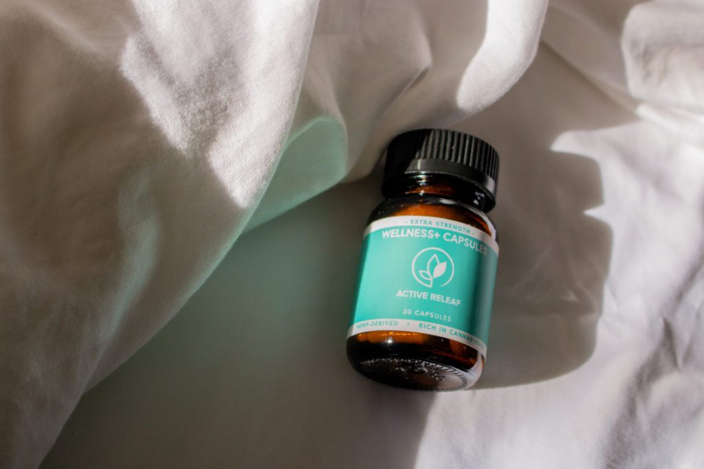 Wellness Capsules on Bed